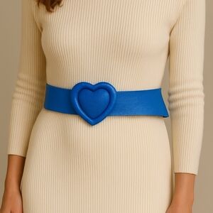 Women's belt made of genuine leather in a blue color. Stylish heart-shap…